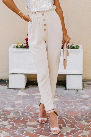 Hlače marelične barve in širokimi žepi Eberta